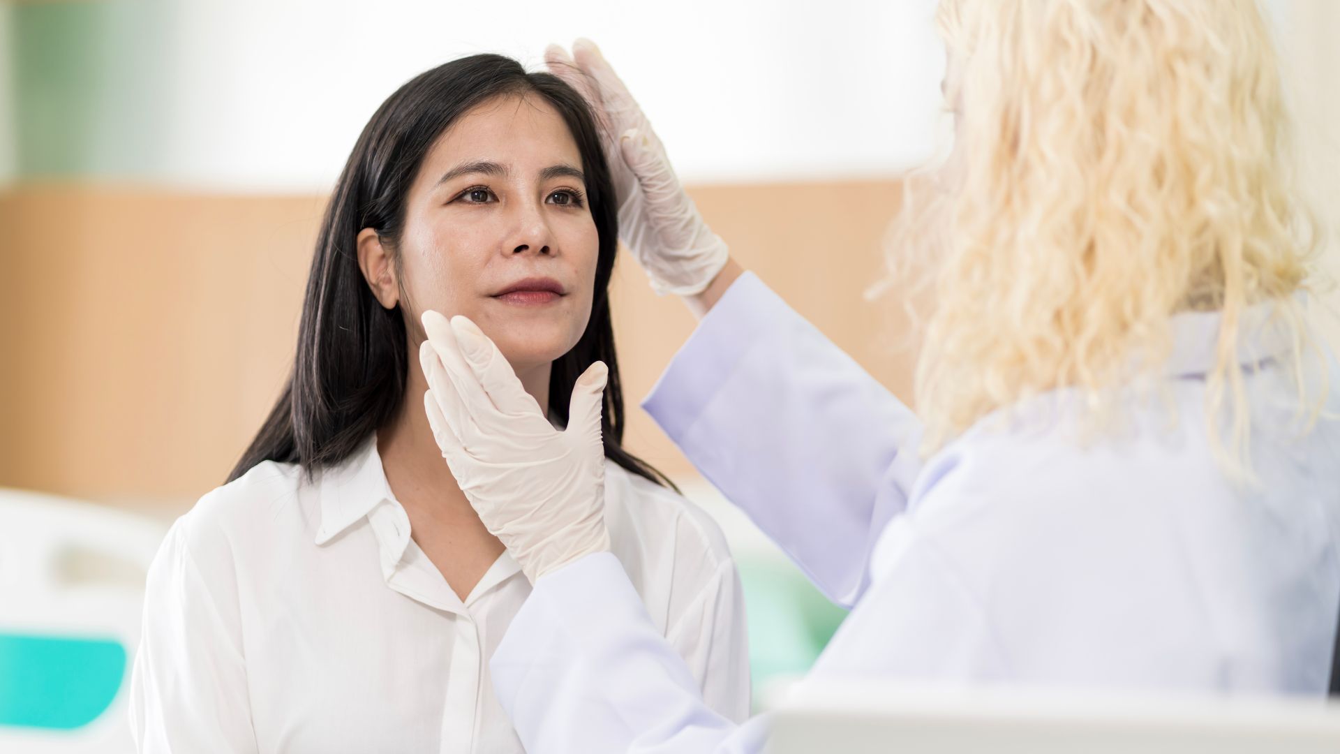 woman consulting about Cosmetic surgeon and make Botox injections on face for beauty procedures. Plastic surgery in face of woman